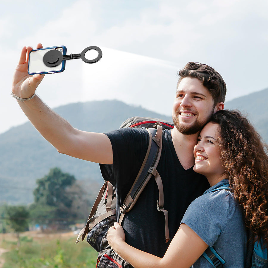 Lover taking photograph with selfie light