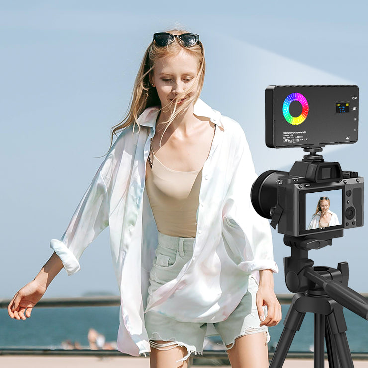 A girl using an RGB fill light for outdoor live streaming