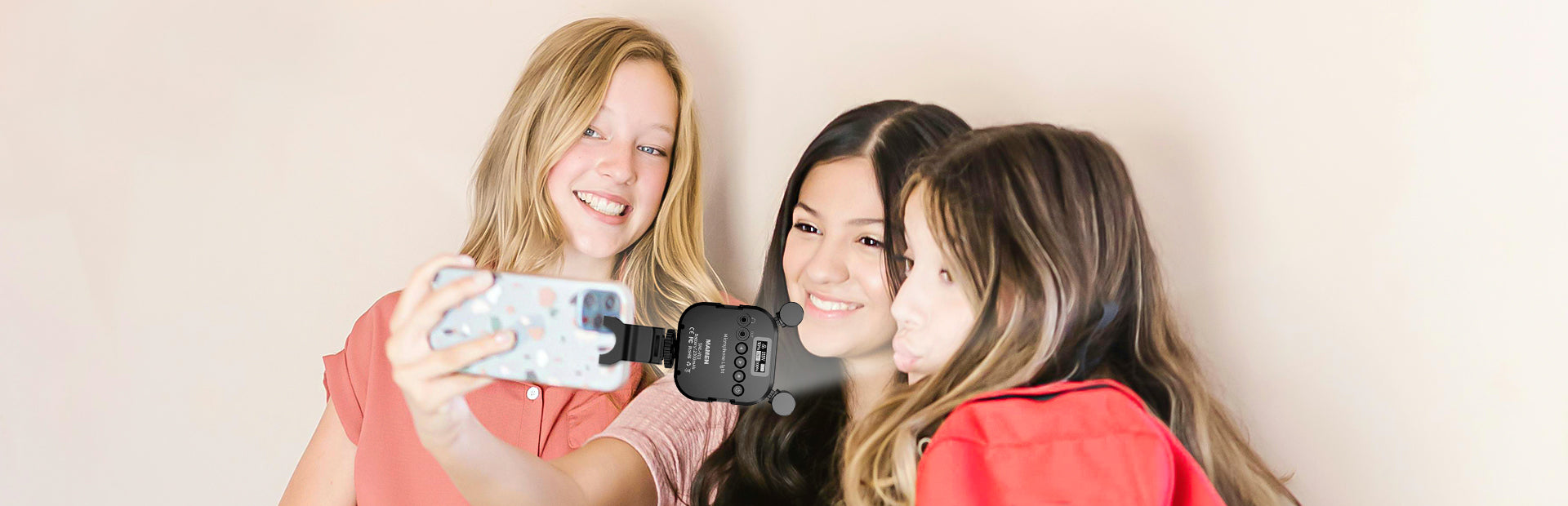 Three girls selfie with the selfie light